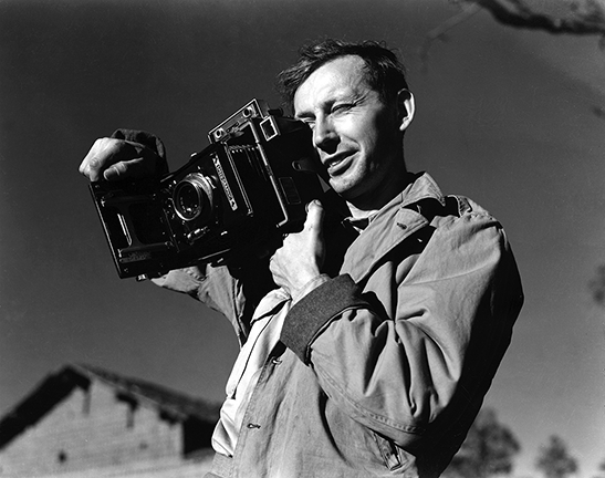 Eugene T. Wozniak with a Speed Graphic camera in China during WWII.