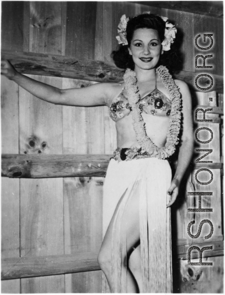Celebrities visit and perform at Yangkai, Yunnan province, during WWII: Mary Landa poses in her performance outfit at Yangkai.