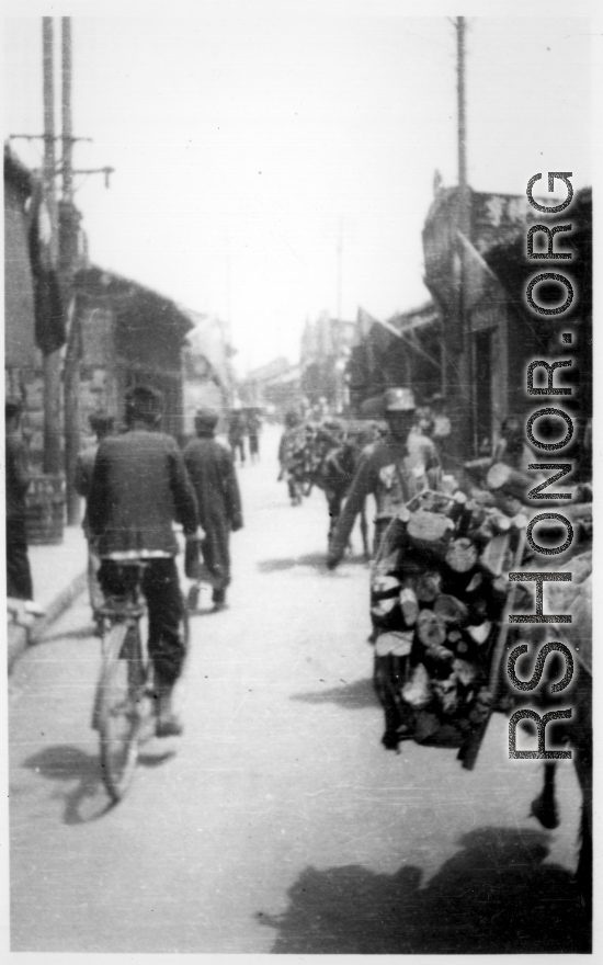 Busy street at Hanzhong, during WWII.