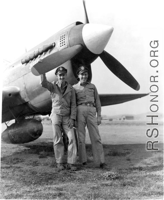 American flyers pose with P-40 fighter plane nicknamed "Jeffery C." in the CBI during WWII.