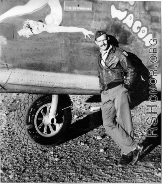 Flyer stands before F-7A/B-24 "My Assam Wagon."  24th Combat Mapping Squadron, 8th Photo Reconnaissance Group, 10th Air Force.
