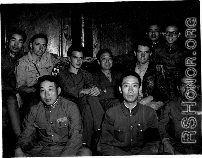 Both Chinese and American soldiers pose with KMT civilian official at rally. This should be An Zefa (安则法), a highly educated official who had a number of roles in Yunnan during WWII.