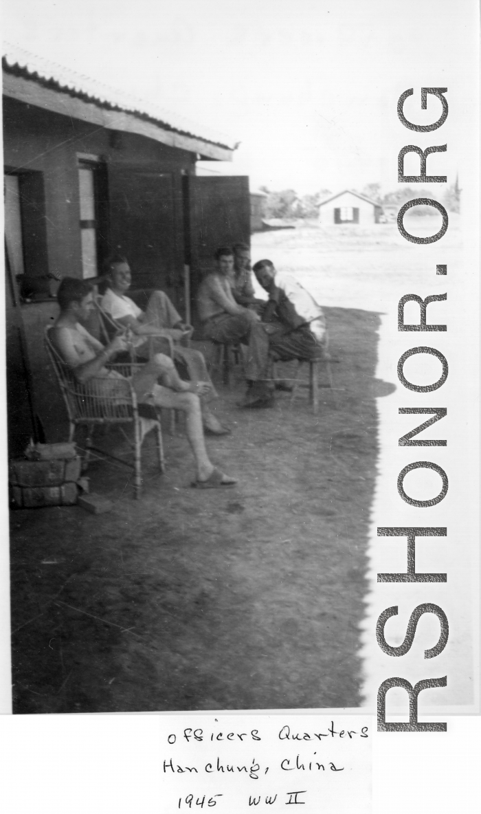 American officers lounging in the cool shade at the officer's quarters at Hanzhong, China, 1945.