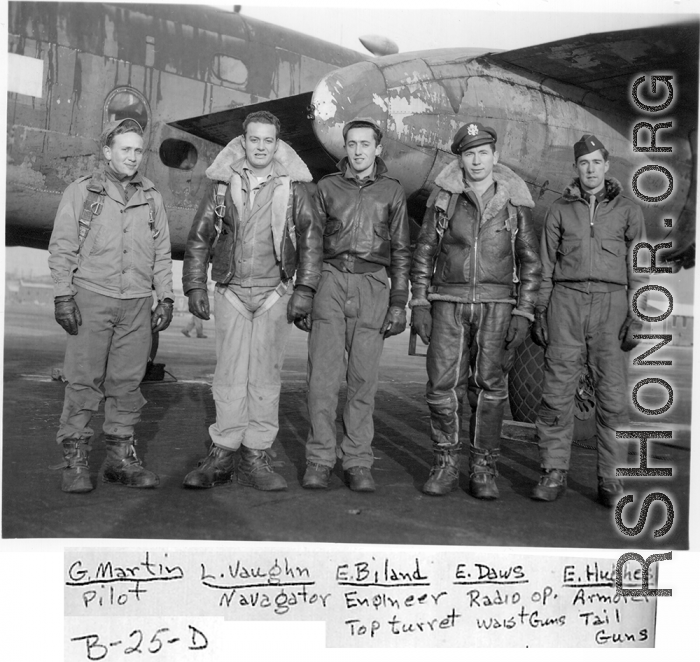 Pilot George Martin and his crew pose before a B-25-D during WWII. L-R: L. Vaughn, E. Biland, E. Daws, and E. Hughes.