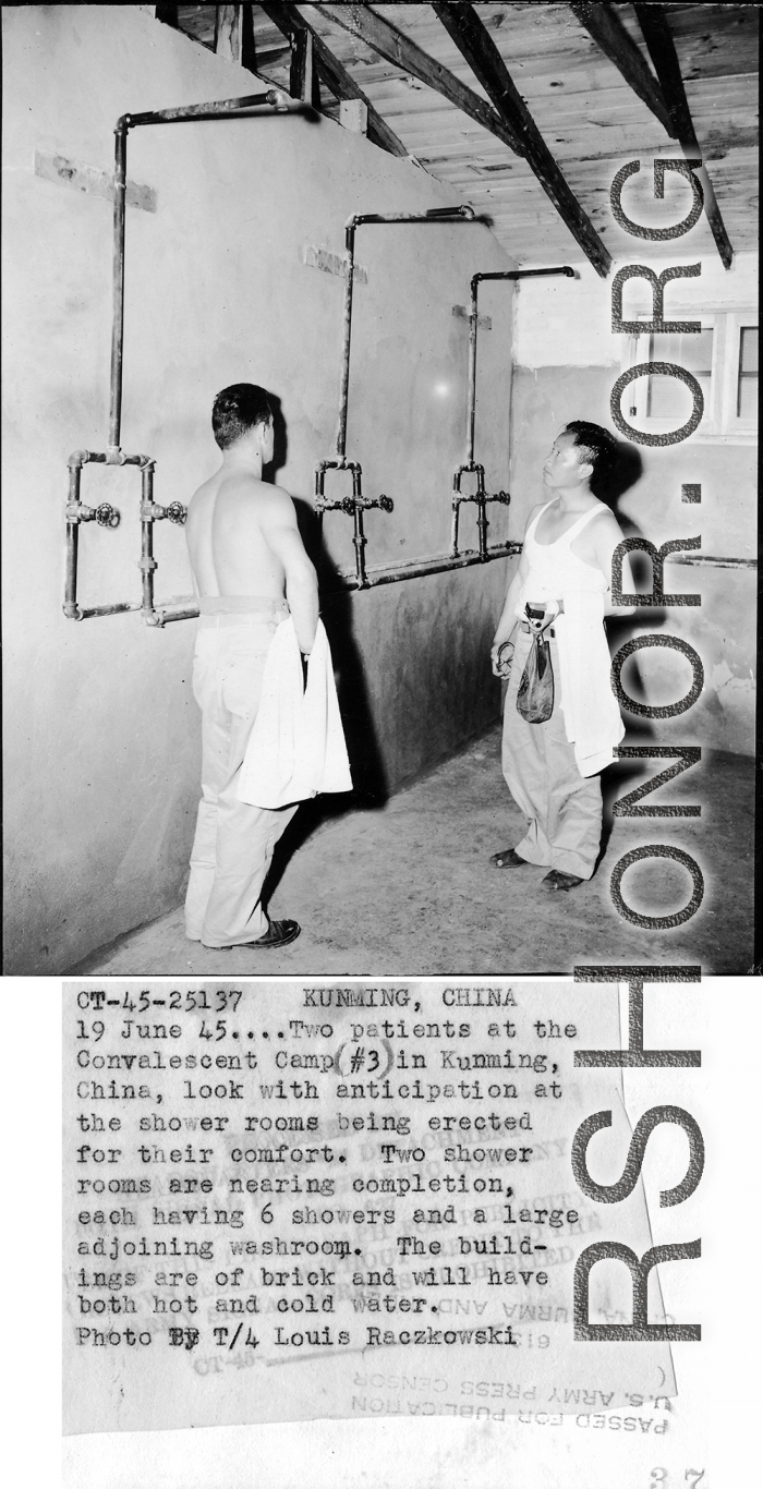 Two patients at the Convalescent Camp (#3) in Kunming, China, look with anticipation at the shower rooms being erected for their comfort. Two shower rooms are nearing completion, each having 6 showers and a large adjoining washroom. The buildings are of brick and will have both hot and cold water.  June 19, 1945.  Photo by T/4 Louis Raczkowski. 