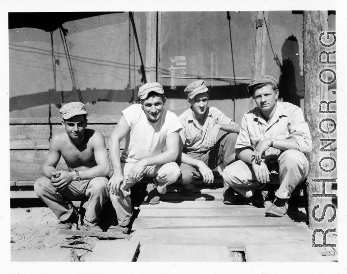 Engineers of the 797th Engineer Forestry Company pose outside tent in Burma.  During WWII.