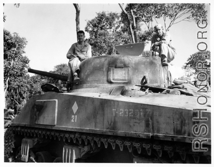 GIs on tank along Burma Road.  797th Engineer Forestry Company in Burma.  During WWII.