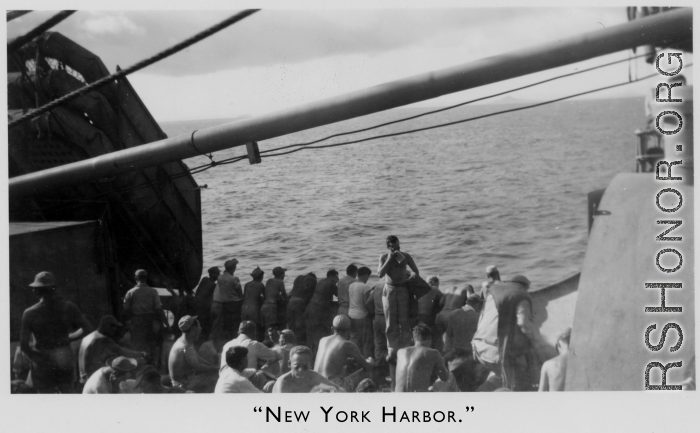 View from the troopship MS Torrens taking the Americans, including Schuhart, home, in late 1945. The back of the photo had the annotation "New York Harbor" on it, but this image in definitely not New York--the pointy mountains in the distance do not match New York, and they arrived New York in December, which would not be the sweltering hot scene here. 