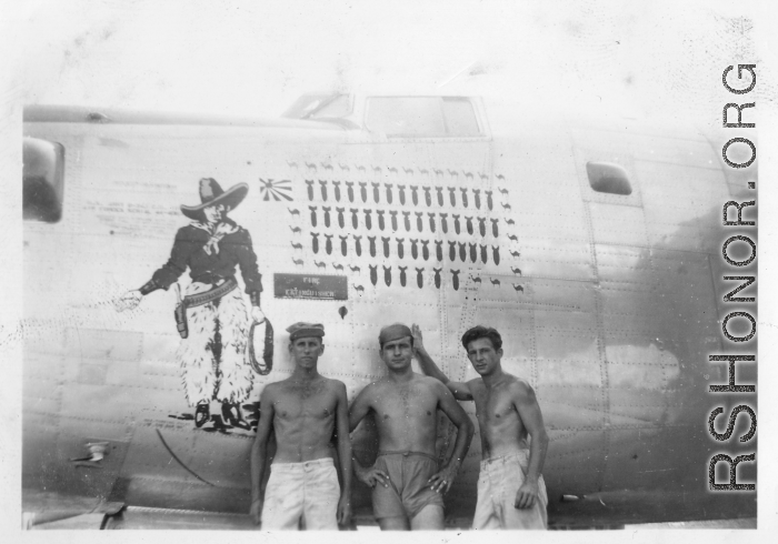 Flyers pose with B-24J bomber "Cactus Kid," serial #44-40857. 10th Air Force, 7th Bombardment Group, 9th Bombardment Squadron.  Walter Wegner on far left.  During WWII.