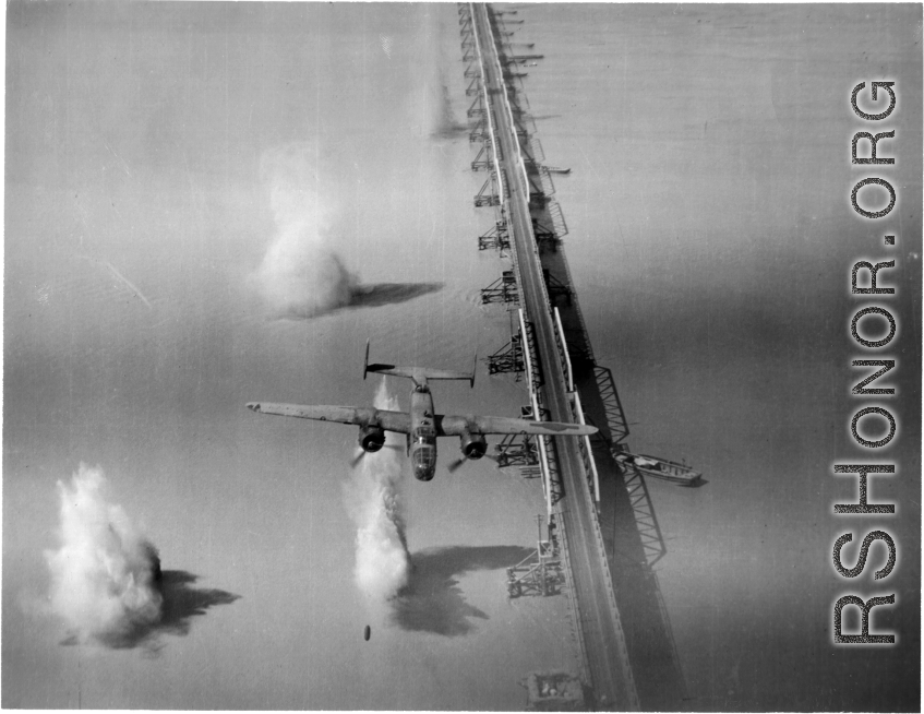 A B-25 on a bombing run over a bridge in the CBI.