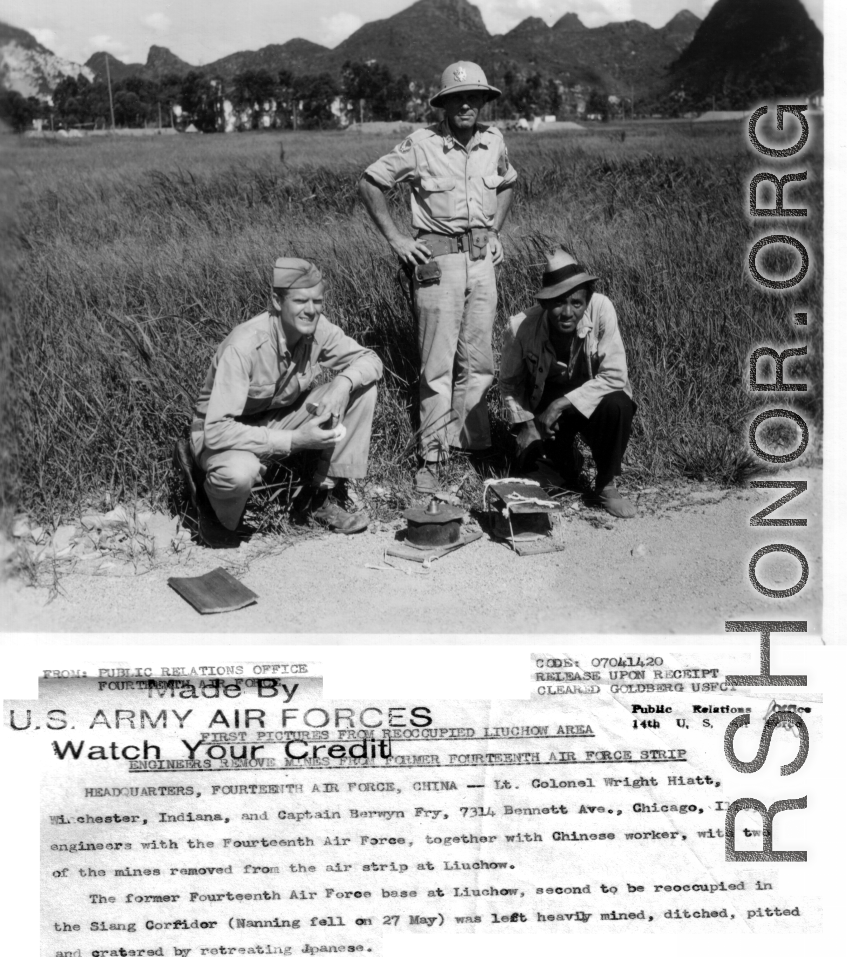Lt. Colonel Wright Hiatt, Winchester, Indiana, and Capt. Berwyn Fry, 7314 Bennett Ave., Chicago, Ill., Engineers with the 14Th Air Force, and a Chinese worker, with two of the Japanese mines removed from the air strip, at Liuzhou (Liuchow), China.