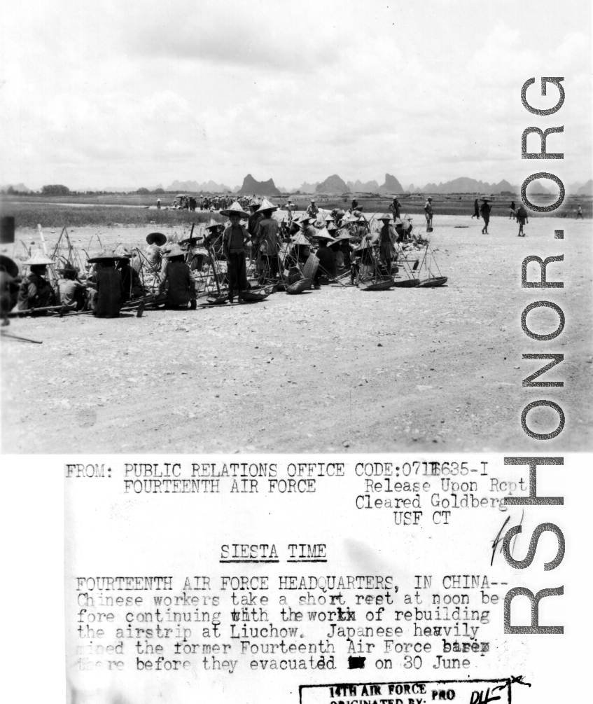 Chinese laborers rest at noon on their work to rebuild the air strip at Liuzhou, Guangxi province, in the CBI, in 1944.