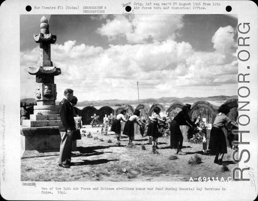 Men of the 14th Air Force and Chinese civilians honor war dead during Memorial Day service in China. 1944