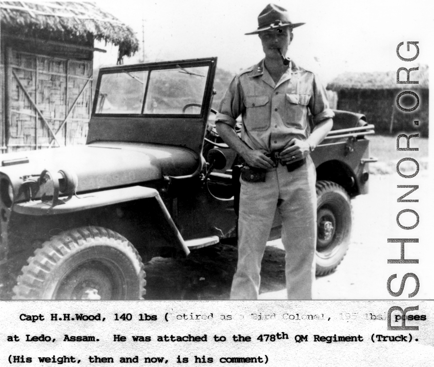 Capt. H. H. Wood poses with his jeep at Ledo, Assam. 478th Quartermaster Regiment, Truck.