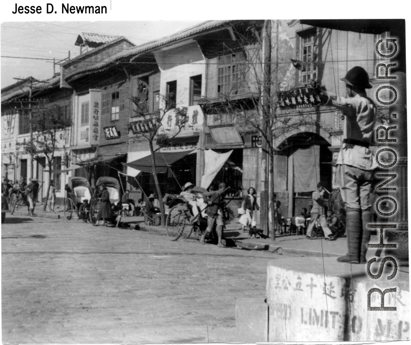 Street scene in Chinese town in the CBI during WWII. Photo from Jesse. D. Newman.