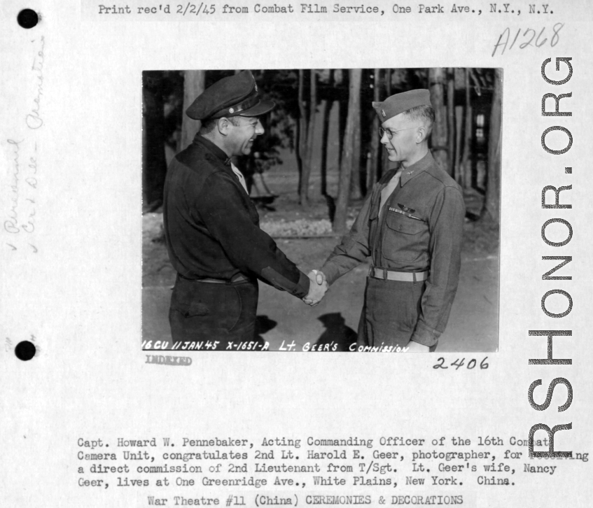 Capt. Howard W. Pennebaker of the 16th Combat Camera Unit congratulation 2nd Lt. Harold E. Geer on direct commision from T/Sgt. to 2nd Lt. January 11, 1945, in the CBI.