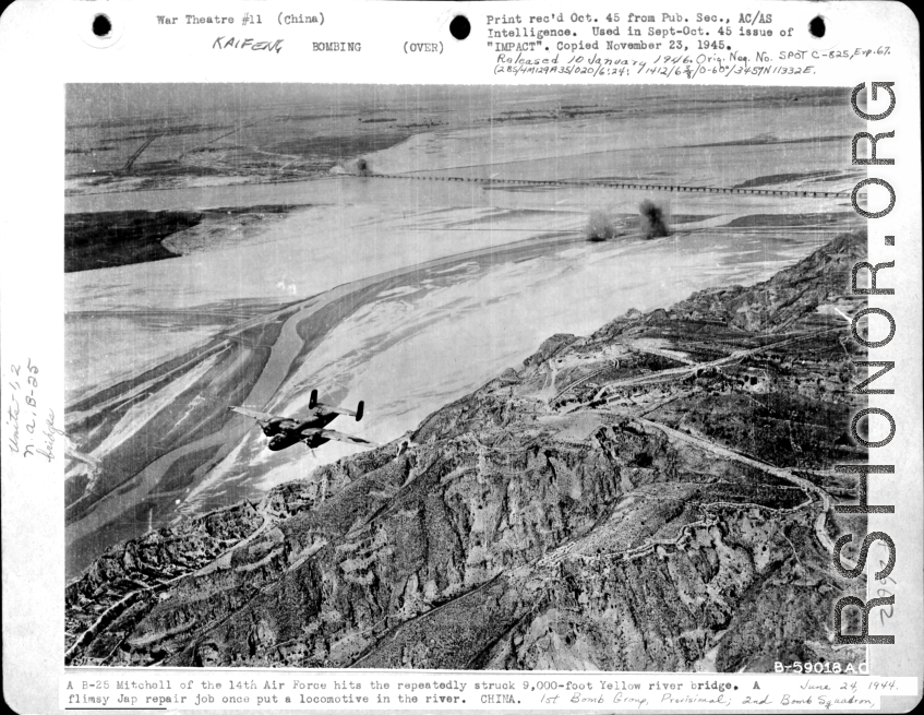 A B-25 bombs 9000-foot Yellow River bridge. June 24, 1944, 1st Bomb Group, Provisional; 2nd Bomb Squadron. Near Kaifeng, Henan, China.