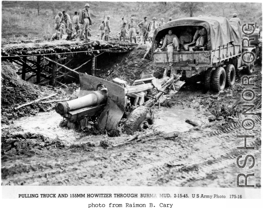 Pulling truck and 155mm Howitzer through mud on Burma Road, February 15, 1945.   US Army Photo.  Image from Raimon B. Cary.