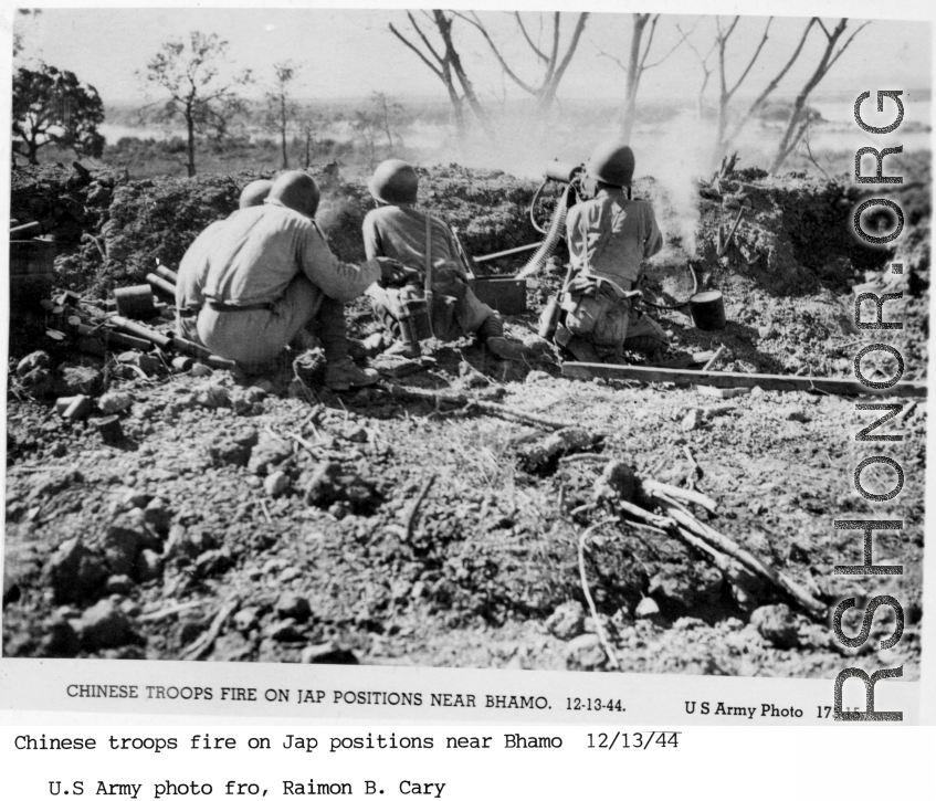 Chinese troops fire on Japanese positions near Bhamo, Burma, on December 13, 1944.  US Army Photo, from Raimon B. Cary.