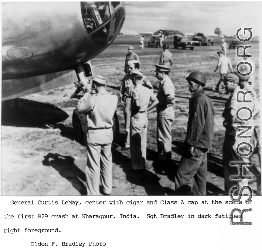 General Curtis LeMay at scene of first B-29 crash at Kharagpur, India.   Photo from Eldon F. Bradley (Sgt. Bradley in dark fatigues right foreground).