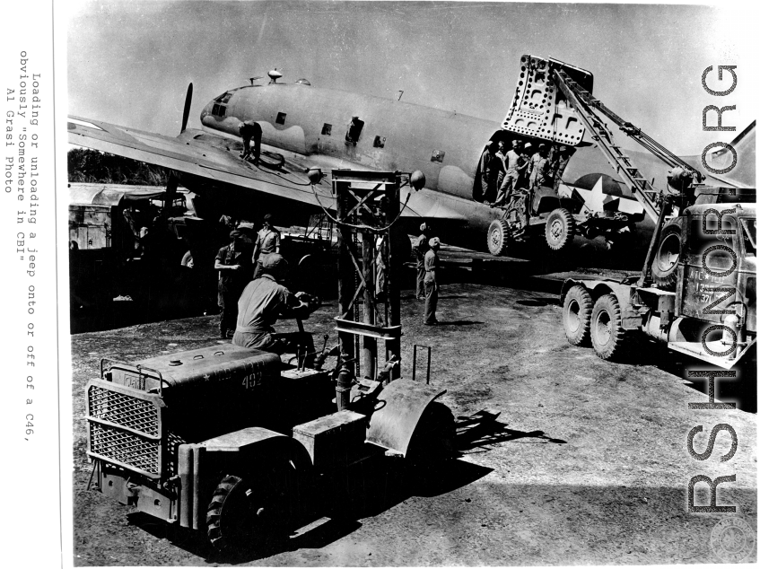 "Loading or unloading a jeep on or off of a C-46, obviously somewhere in the CBI."  Photo from Al Grasi.