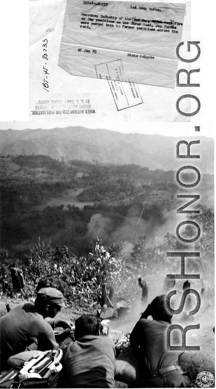 American troops of the 2nd Battalion, 279th Regiment, use a machine gun to fire upon Japanese positions on the Burma Road, at Loi Kang Burma. January 26, 1945.   Photo by Colgate.