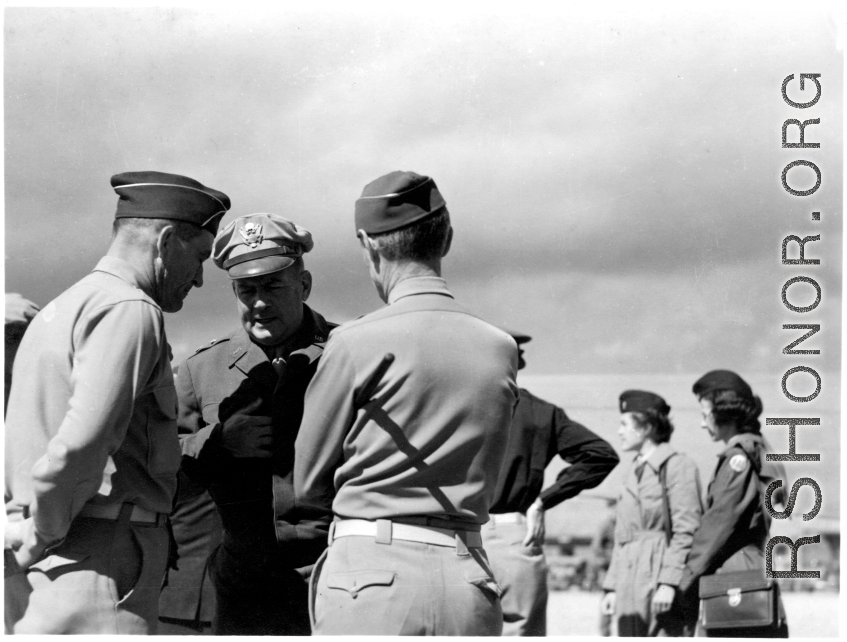 Chennault talks with officers in the CBI during WWII.