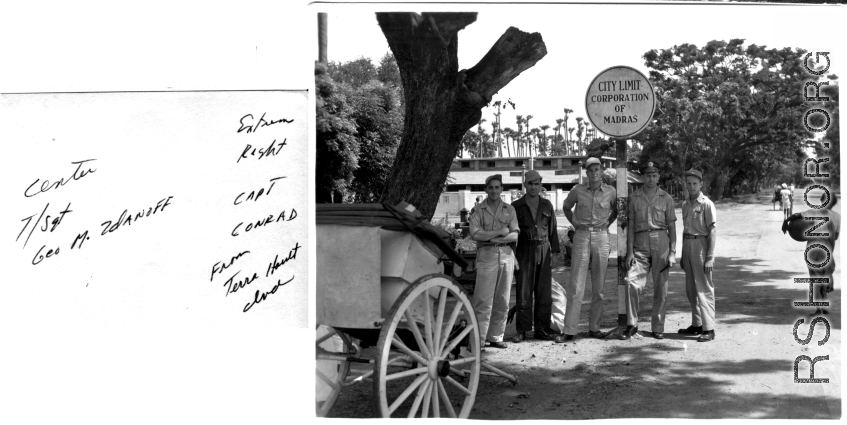 GIs at the Madras, India, city limits during WWII. Center T/Sgt. George M. Zdanoff. Far right: Capt. Conrad.