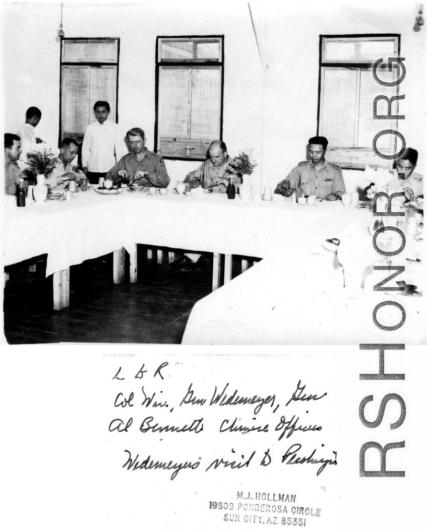Officers such as Col. Wise, Gen. Wedemeyr, Gen. Al Bennett, and Chinese officers, enjoy a fine meal at Peishiyi upon a visit by Wedemeyer. During WWII.  Photo from M. J. Hollman.
