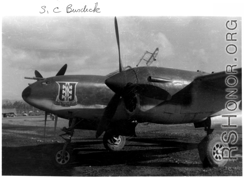 A P-38 with "Fire From The Clouds" group motto, should be 33rd Fighter Group, 10th Air Force. In the CBI during WWII.  Photo from S. C. Burdick.