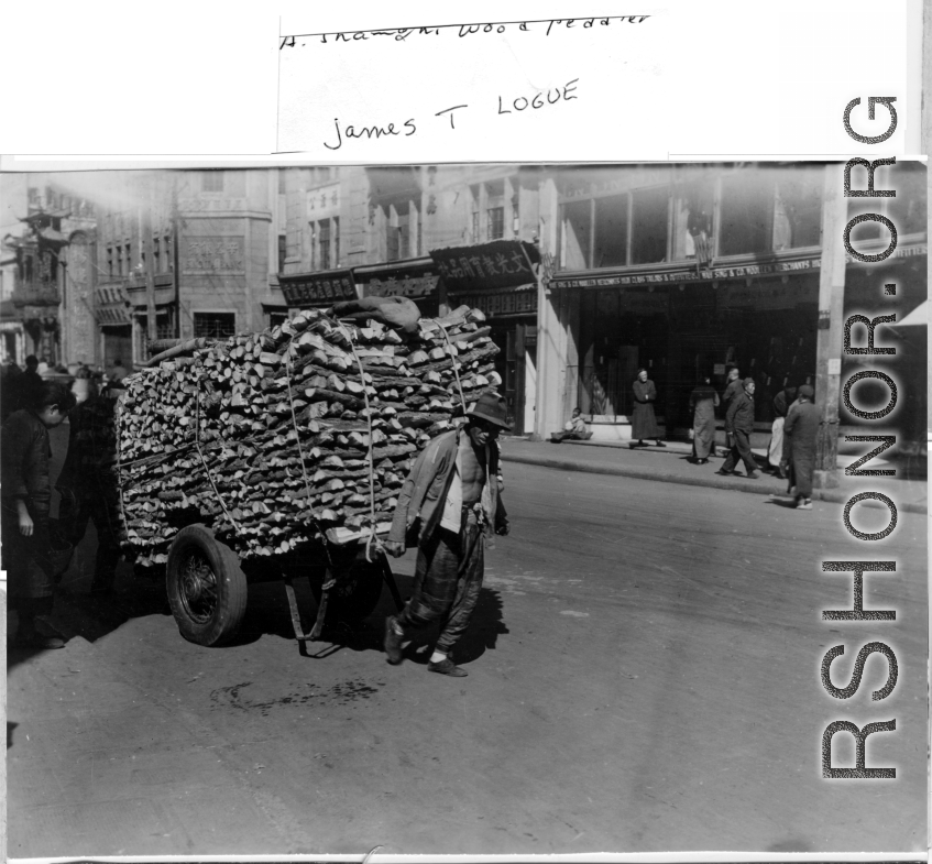 A hard-working wood peddler in Shanghai, right after WWII.  Photo from James T. Logue.