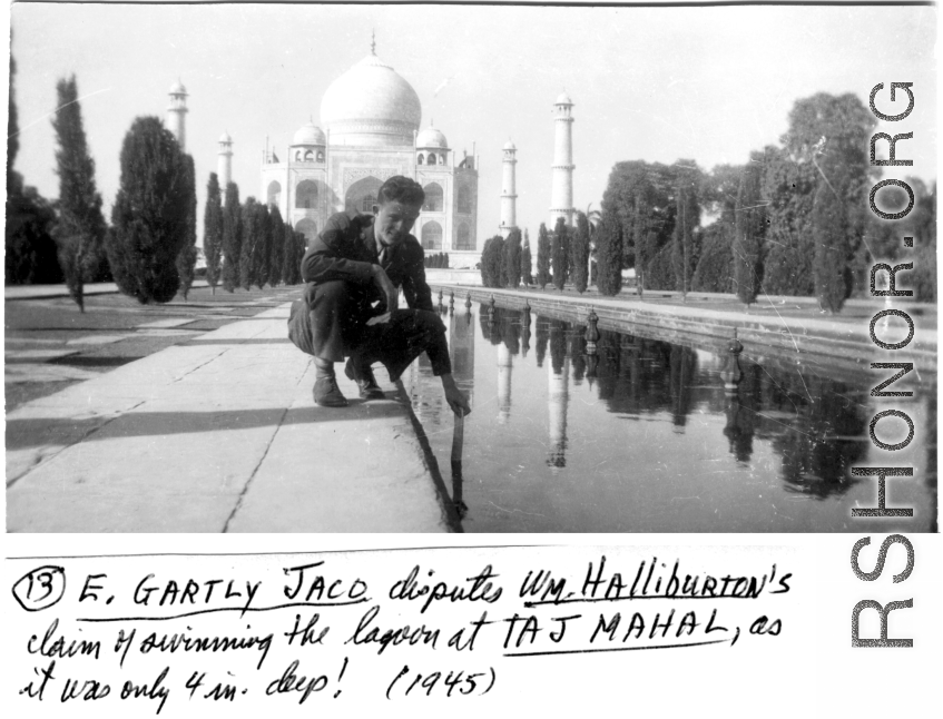 GI E. Gartly Jaco tests the depth of the water at the Taj Mahal in 1945.
