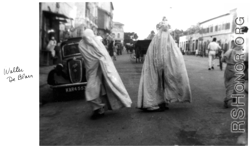 Women in full-body covering in Karachi, India, during WWII.  In the CBI during WWII.  Photo from Walter De Blair.