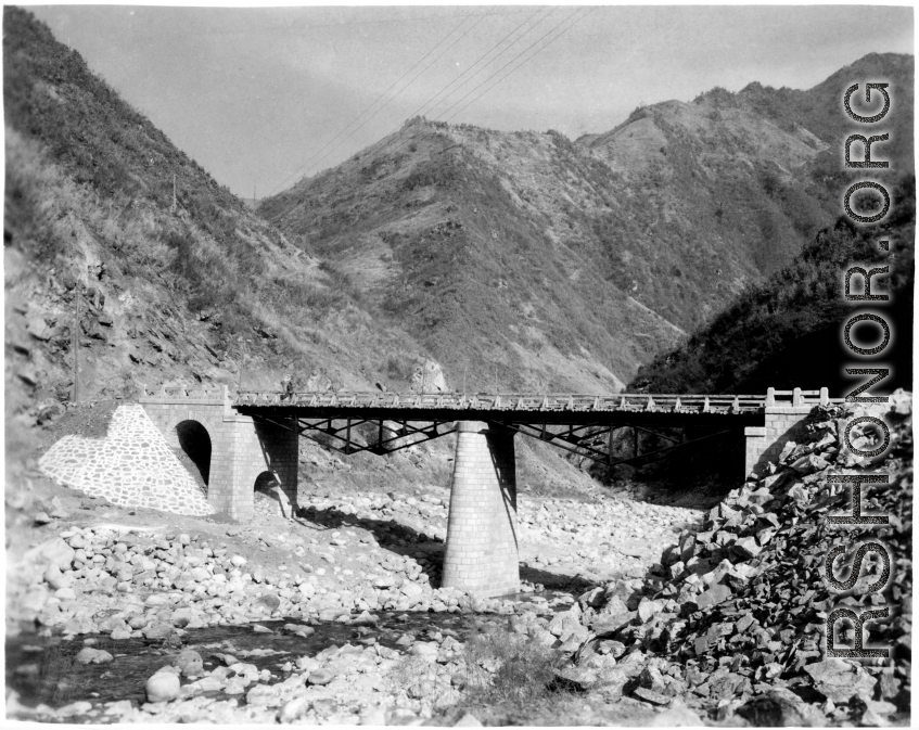 A tidy iron/steel bridge in China during WWII, possibly in northern China.  Image provided by Dorothy Yuen Leuba.