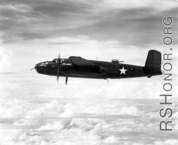 Photograph of B-25C in flight in the CBI, tail number 130367 (serial number 41-30367). Notice the machine gun (.50 cal.) barrel sticking out of the belly of '367.'  This 491st Bomb Squadron aircraft was damaged by flak on 20 Dec 1943 and the crew bailed out. 2nd Lt. Charles H. Redd, navigator, became a POW. He survived and returned to the USA in Sep/Oct 1945.