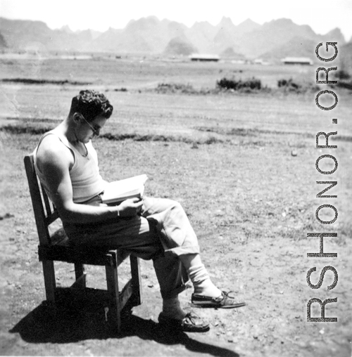 Selig Seidler, a member of the 16th Combat Camera Unit, taking a break at Guilin (Kweilin) or Liuzhou (Liuchow) base, in Guangxi province, China, during the Second World War.