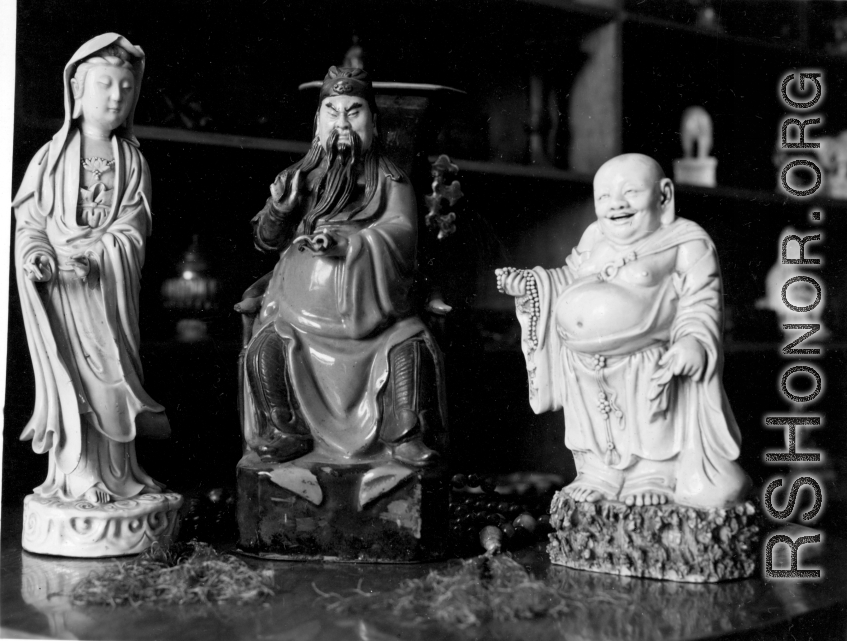 Porcelain statuettes in a shop in China. During WWII.