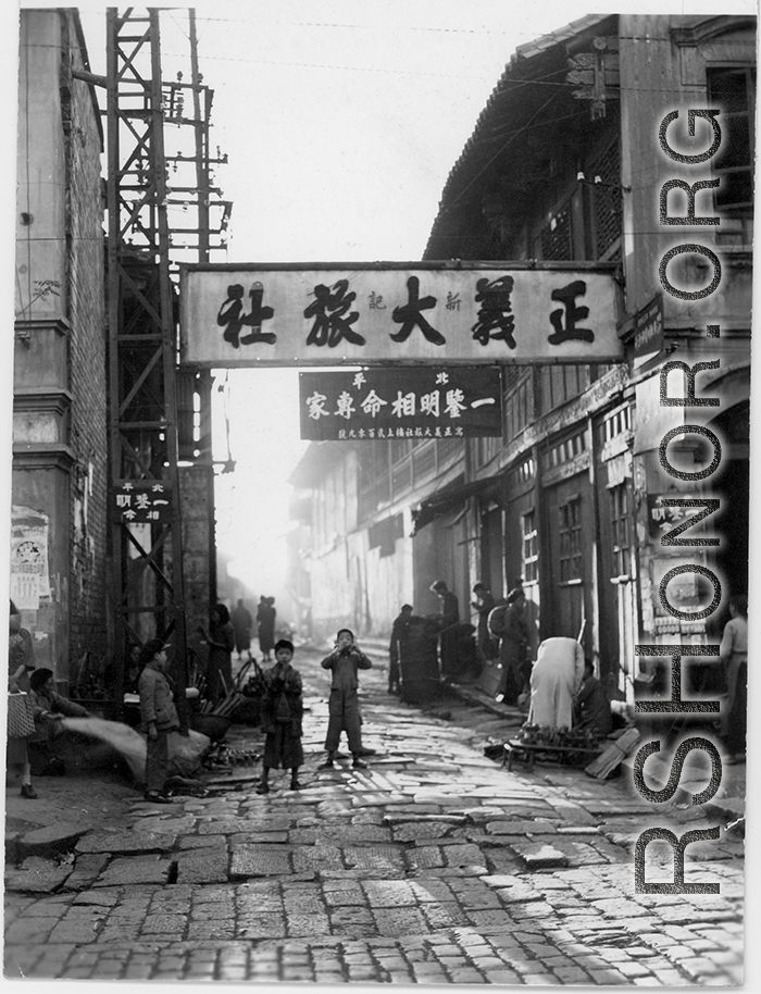 Local people in China: A street scene, most likely Kunming.
