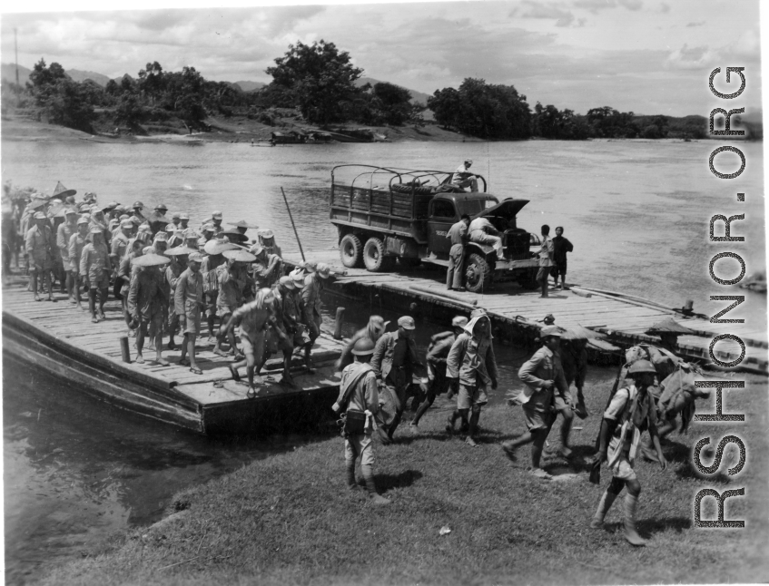 Chinese troops cross the river at Lingling by barge during retreat in the face of the Japanese Ichigo campaign advances in the summer/fall of 1944.