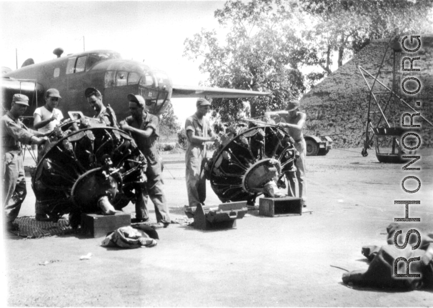 Changing engines in #43. either on July or October 1943. Chaukulia, India.  Mit Rose, Cal Achey, Frank Bert, Pete Romanazzi, Bud Chapin, Alex.
