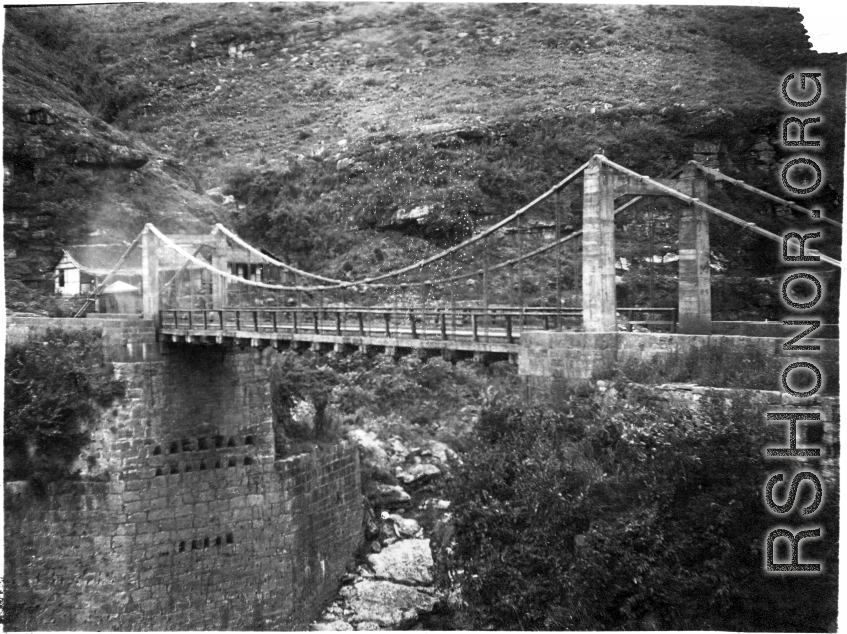 A suspension bridge in SW China during WWII.