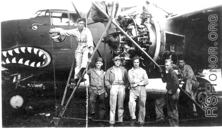 #444 at engine change, Yangkai, China, July 1944  Hammett, Basil Turko, Aspinwall, Bert, unk., and Burns  From the collection of Frank Bates.