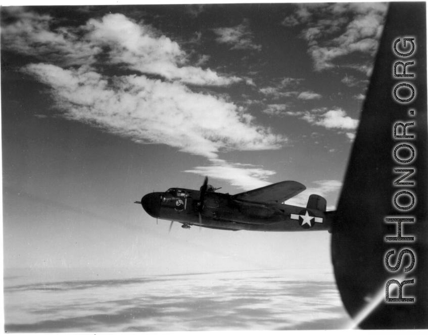 Nicknamed "Joyce Marie", Johnny Burns' B-25 H (441) flying from Yangkai, 1944.