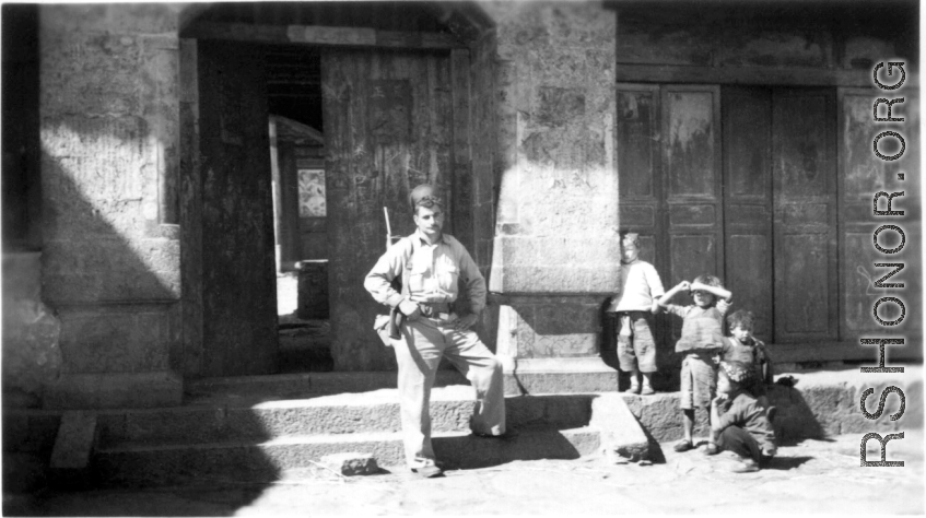 Clayton E. "Fred" Nash at town hall, 10 miles east of Yangkai, Spring 1945.   From the collection of Frank Bates.