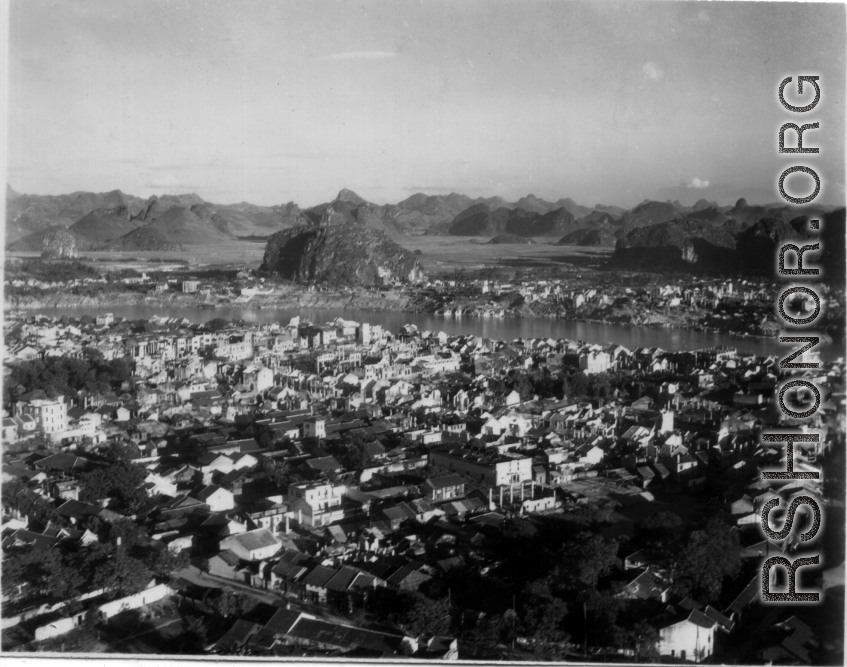 Aerial view of Liuzhou, Guangxi, China, during WWII, showing the break-neck post-occupation recovery and rebuilding after the Japanese retreat. 1945.