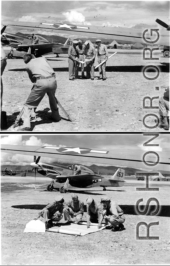 General Chennault on the flight line in conference with pilot officers, navigators, and bombardiers, while a camera crew catches it all in this contrived scene. In China, during WWII.