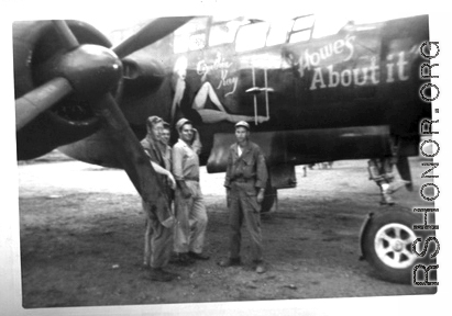 Four GIs pose in Luliang before B-25 "Howe's About It."  Henry Weiss, Tec 4, 219th Signal Depot Company, standing on the far right. During WWII.