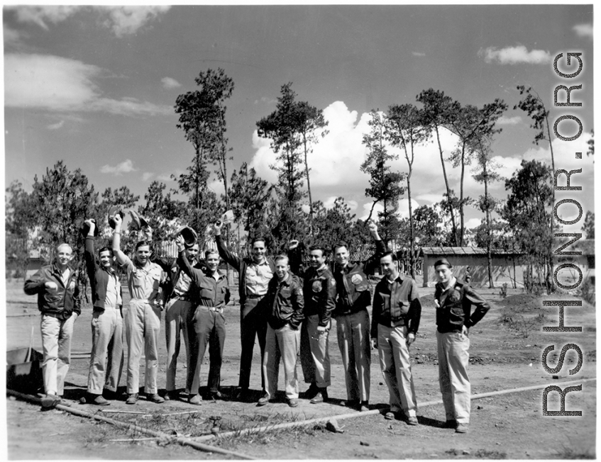 GIs cheer at the hostel area at Yangkai air base during WWII.