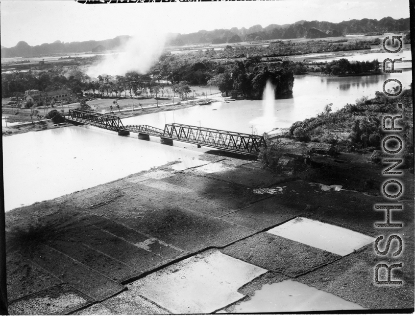 Bombing of Ninh-Bình railway bridge in French Indochina (Vietnam), during WWII. Ninh Bình is a small city in the Red River Delta of northern Vietnam, and along a critical rail route used by the Japanese.  Coordinates: 20°15'39.7"N 105°59'06.3"E