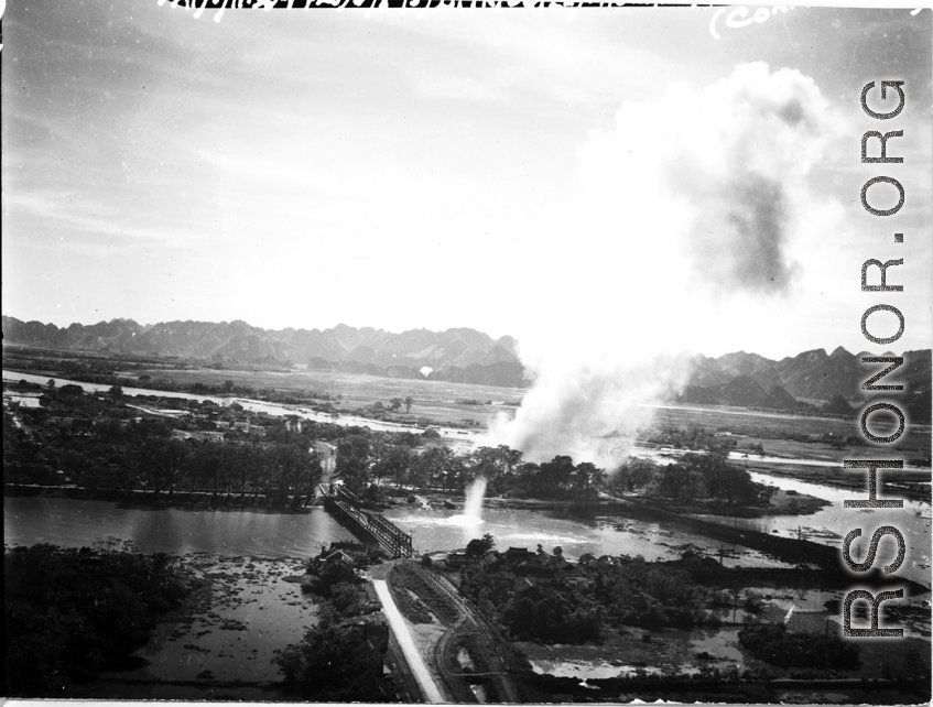 Bombing of Phy Ly railway bridge in French Indochina (Vietnam), during WWII. In northern Vietnam, and along a critical rail route used by the Japanese.